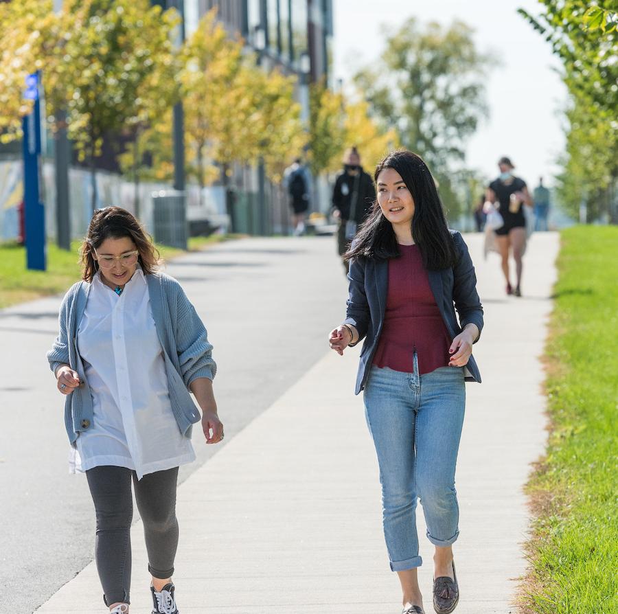 Students walking campus greenway
