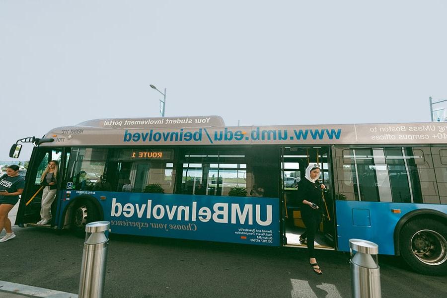 UMass Boston shuttle bus at the Campus Center stop.